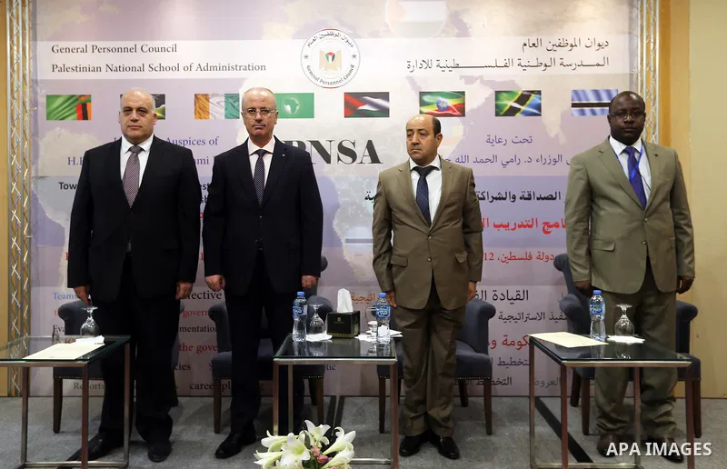 Palestinian Prime Minister, Rami Hamdallah, attends the opening of the "African training program" at the National School of Administration, in the West Bank city of Ramallah, on August 12, 2018. Photo by Prime Minister O...
