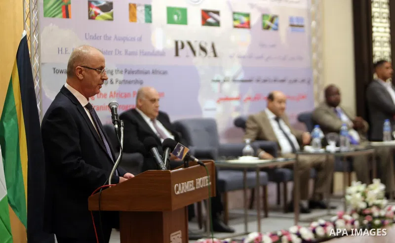 Palestinian Prime Minister, Rami Hamdallah, attends the opening of the "African training program" at the National School of Administration, in the West Bank city of Ramallah, on August 12, 2018. Photo by Prime Minister O...