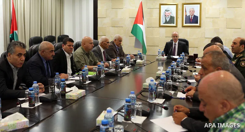 Palestinian Prime Minister, Rami Hamdallah, chairs a meeting of the leaders of the security establishment, in the West Bank city of Ramallah, on August 13, 2018. Photo by Prime Minister Office