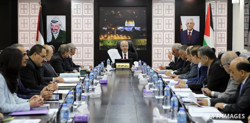 Palestinian Prime Minister Rami Hamdallah chairs a meeting with council of Ministers in the West Bank city of Ramallah on August 14, 2018. Photo by Prime Minister Office