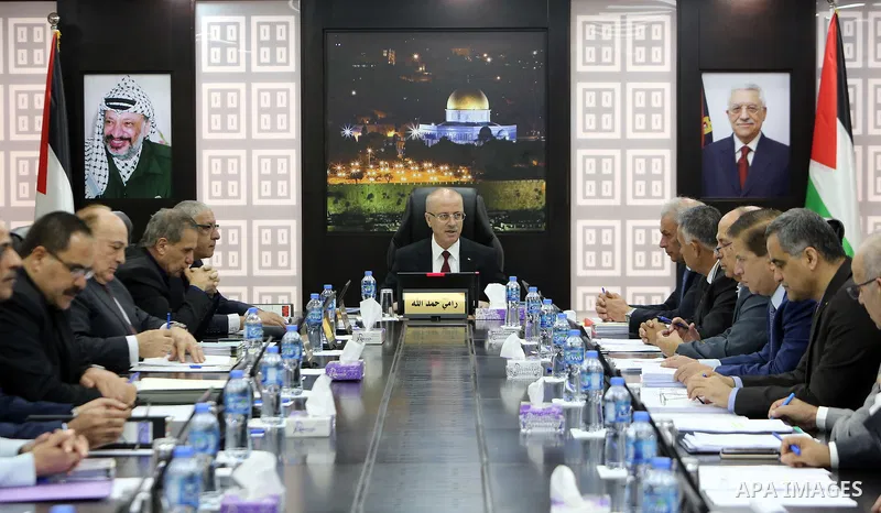 Palestinian Prime Minister Rami Hamdallah chairs a meeting with council of Ministers in the West Bank city of Ramallah on August 14, 2018. Photo by Prime Minister Office