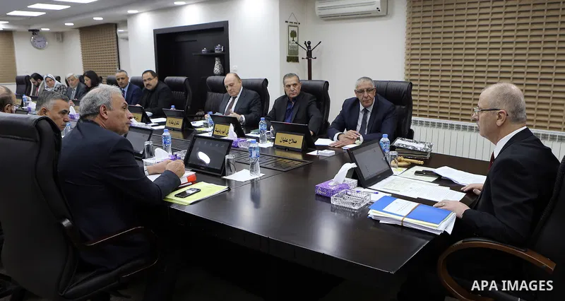 Palestinian Prime Minister Rami Hamdallah chairs a meeting with council of Ministers in the West Bank city of Ramallah on August 14, 2018. Photo by Prime Minister Office