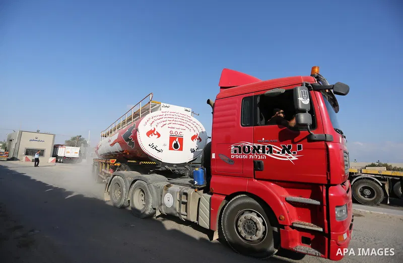 Fuel tankers arrive at Kerem Shalom crossing in Rafah in the southern Gaza Strip, on August 15, 2018. Israel's defence minister has announced it will reopen the main cargo crossing with the Gaza Strip on Wednesday if the...