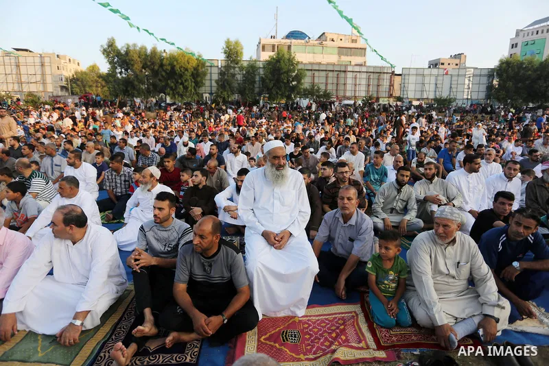 Palestinian muslims perform the prayer of Eid al-Adha or the feast of sacrifice in Gaza city, on August 21, 2018. Muslims around the world are celebrating Eid al-Adha, the "Feast of Sacrifice", which marks the end of the...
