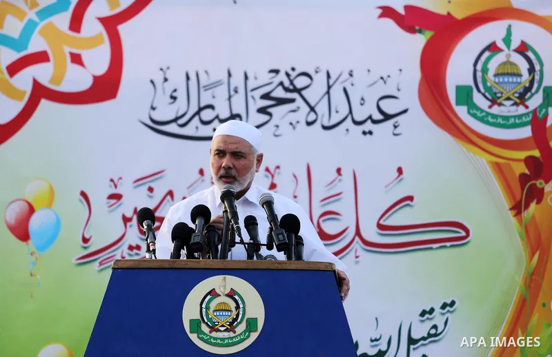 Chairman of the political bureau of the Hamas Palestinian Islamist movement, Ismail Haniyeh speaks during the prayer of Eid al-Adha or the feast of sacrifice in Gaza city, on August 21, 2018. Muslims around the world are...