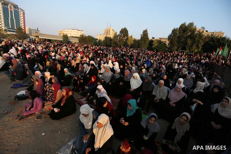 Palestinian muslims perform the prayer of Eid al-Adha or the feast of sacrifice in Gaza city, on August 21, 2018. Muslims around the world are celebrating Eid al-Adha, the "Feast of Sacrifice", which marks the end of the...