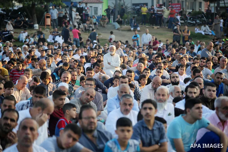 Palestinian muslims perform the prayer of Eid al-Adha or the feast of sacrifice in Gaza city, on August 21, 2018. Muslims around the world are celebrating Eid al-Adha, the "Feast of Sacrifice", which marks the end of the...