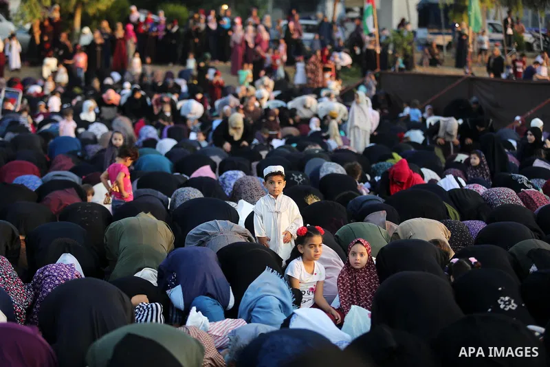 Palestinian muslims perform the prayer of Eid al-Adha or the feast of sacrifice in Gaza city, on August 21, 2018. Muslims around the world are celebrating Eid al-Adha, the "Feast of Sacrifice", which marks the end of the...