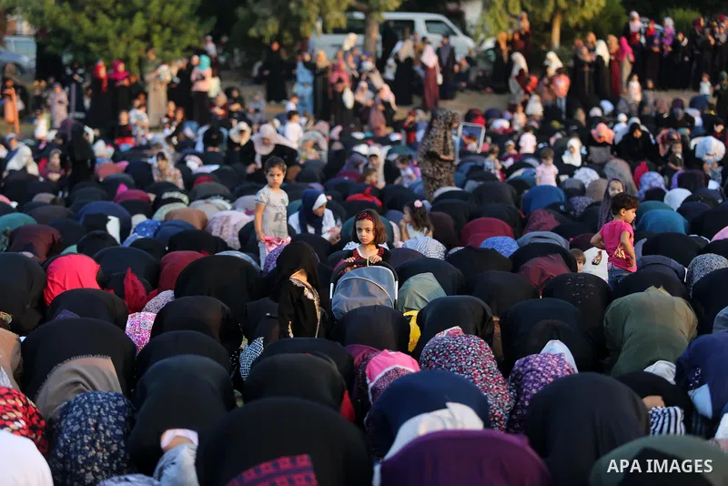 Palestinian muslims perform the prayer of Eid al-Adha or the feast of sacrifice in Gaza city, on August 21, 2018. Muslims around the world are celebrating Eid al-Adha, the "Feast of Sacrifice", which marks the end of the...