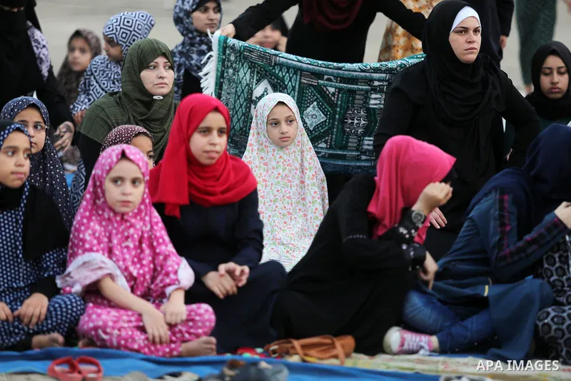 Palestinian muslims perform the prayer of Eid al-Adha or the feast of sacrifice in Gaza city, on August 21, 2018. Muslims around the world are celebrating Eid al-Adha, the "Feast of Sacrifice", which marks the end of the...
