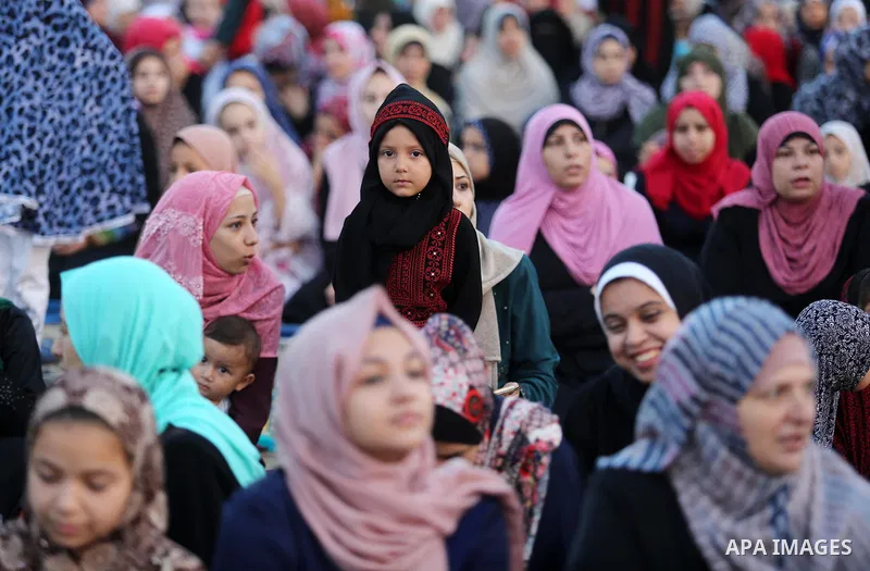 Palestinian muslims perform the prayer of Eid al-Adha or the feast of sacrifice in Gaza city, on August 21, 2018. Muslims around the world are celebrating Eid al-Adha, the "Feast of Sacrifice", which marks the end of the...