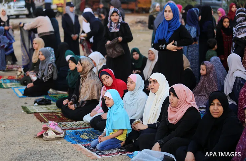 Palestinian muslims perform the prayer of Eid al-Adha or the feast of sacrifice in Gaza city, on August 21, 2018. Muslims around the world are celebrating Eid al-Adha, the "Feast of Sacrifice", which marks the end of the...