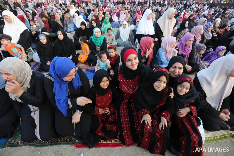 Palestinian muslims perform the prayer of Eid al-Adha or the feast of sacrifice in Gaza city, on August 21, 2018. Muslims around the world are celebrating Eid al-Adha, the "Feast of Sacrifice", which marks the end of the...