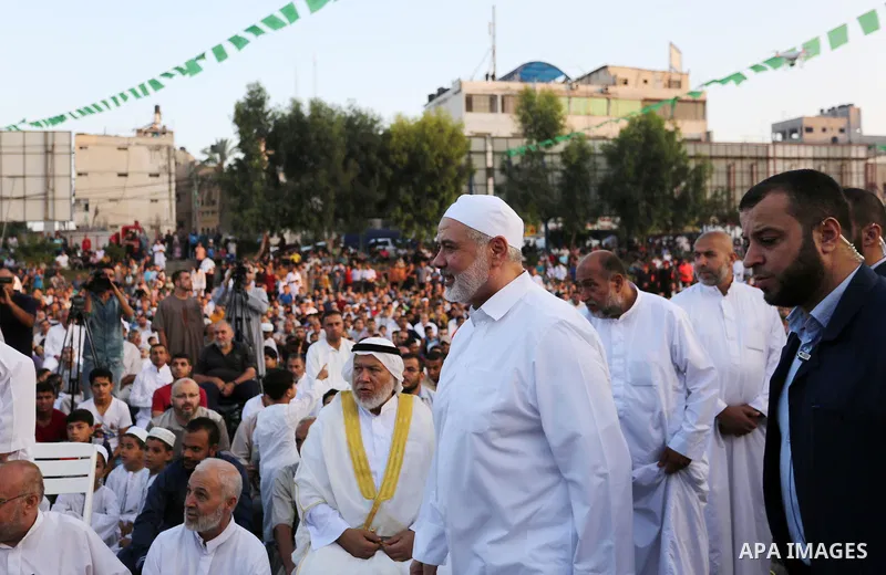 Chairman of the political bureau of the Hamas Palestinian Islamist movement, Ismail Haniyeh arrives to attend the prayer of Eid al-Adha or the feast of sacrifice in Gaza city, on August 21, 2018. Muslims around the world...