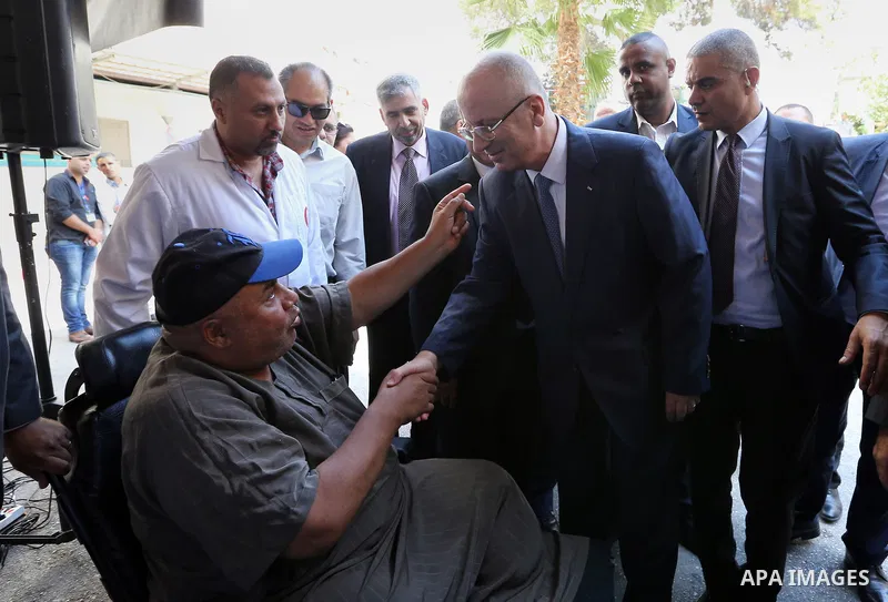 Palestinian Prime Minister, Rami Hamdallah, attends the opening of the National Rehabilitation Center, in the West Bank city of Bethlehem on August 27, 2018. Photo by Prime Minister Office