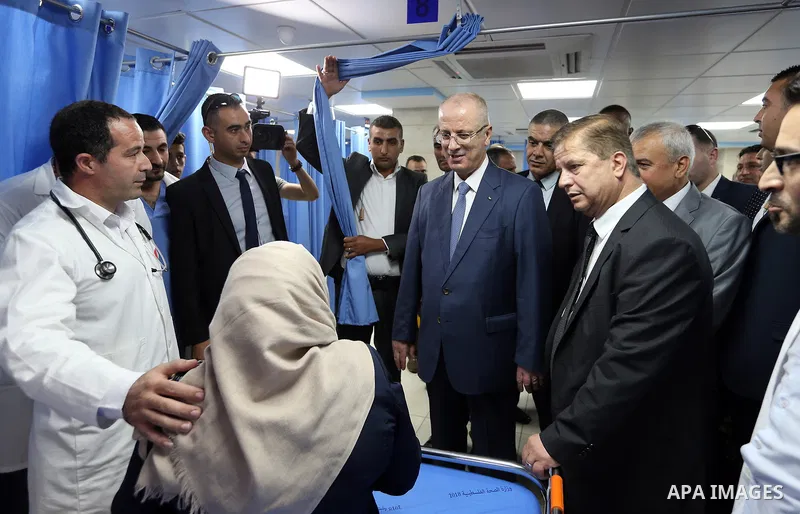 Palestinian Prime Minister, Rami Hamdallah, attends the opening of the National Rehabilitation Center, in the West Bank city of Bethlehem on August 27, 2018. Photo by Prime Minister Office