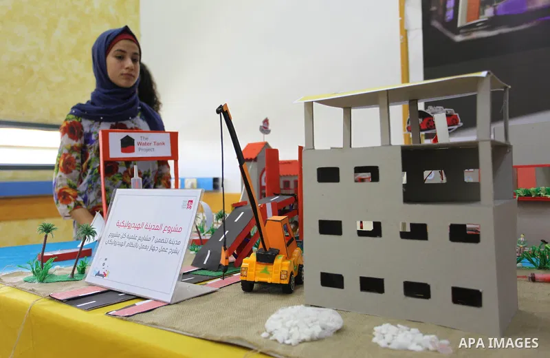 Palestinian children take part in scientific, technological and artistic exhibitions at Qattan Foundation in Gaza city on August 28, 2018. Photo by Mahmoud Ajour