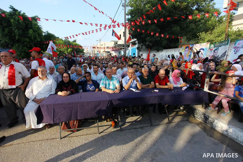 Palestinian supporters of the Popular Front for the Liberation of Palestine (PFLP) take part in a rally marking the The 17th anniversary of the killing of Abu Ali Mustafa, leader of (PFLP), in Jabalia in the northern Gaz...