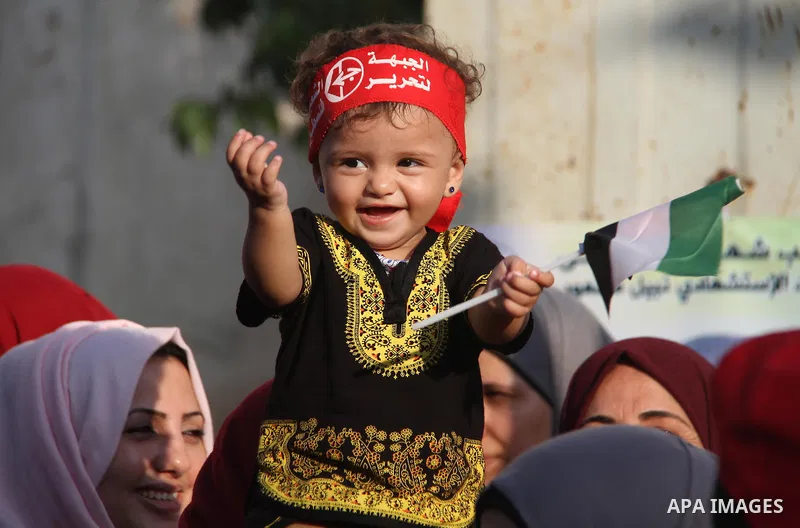 Palestinian supporters of the Popular Front for the Liberation of Palestine (PFLP) take part in a rally marking the The 17th anniversary of the killing of Abu Ali Mustafa, leader of (PFLP), in Jabalia in the northern Gaz...