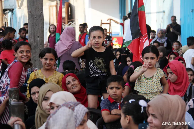 Palestinian supporters of the Popular Front for the Liberation of Palestine (PFLP) take part in a rally marking the The 17th anniversary of the killing of Abu Ali Mustafa, leader of (PFLP), in Jabalia in the northern Gaz...