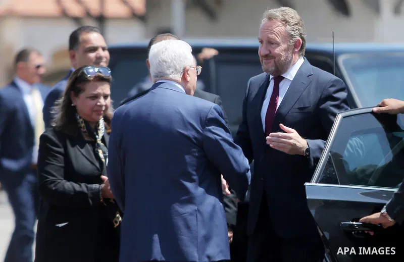 Palestinian President Mahmoud Abbas shakes hands with Chairman of the Tripartite Presidency of Bosnia and Herzegovina Bakir Izetbegovic during a reception ceremony in the West Bank city of Ramallah on August 29, 2018. Ph...