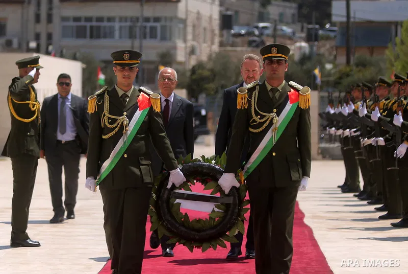 Chairman of the Tripartite Presidency of Bosnia and Herzegovina Bakir Izetbegovic lays a wreath at the tomb of late Palestinian leader Yasser Arafat, in the West Bank city of Ramallah on August 29, 2018. Photo by Shadi H...
