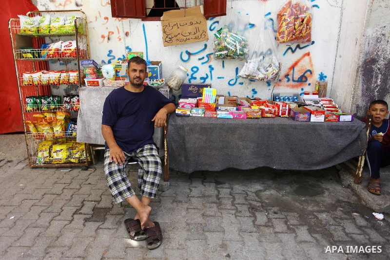 A Palestinian man sells sweets at Al-Shati refugee camp, in Gaza City on September 1, 2018. The United States on Friday halted all funding to United Nations' agency that helps Palestinian refugees. State Department spoke...