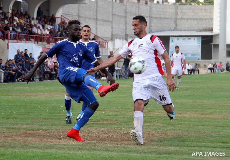 Palestinian Shabab Khan Younis players and Shabab Rafah players compete during Super Cup soccer match, at Palestine Stadium, in Gaza City on September 1, 2018. Photo by Mahmoud Ajour
