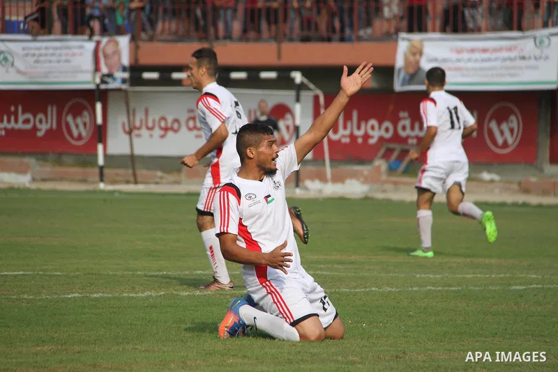 Palestinian Shabab Khan Younis players and Shabab Rafah players compete during Super Cup soccer match, at Palestine Stadium, in Gaza City on September 1, 2018. Photo by Mahmoud Ajour