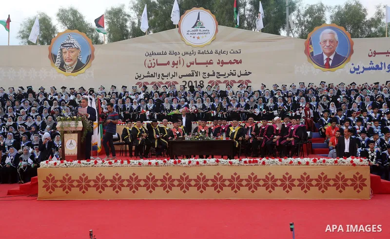 Palestinian students celebrate during their graduation ceremony at al-Aqsa University in Khan Younis in the southern of Gaza strip on Sep. 01, 2018. Photo by Atia Darwish