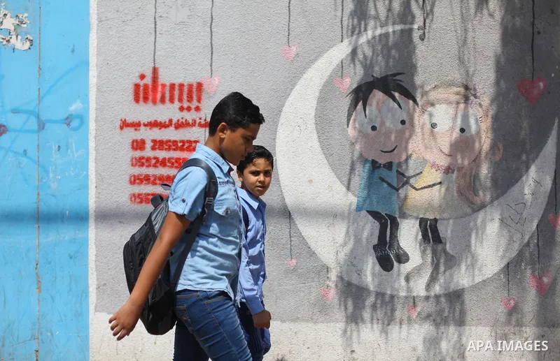 Palestinian students of United Nations-run schools walk in a street in Gaza city on September 2, 2018. The United States on Friday halted all funding to United Nations' agency that helps Palestinian refugees. State Depar...