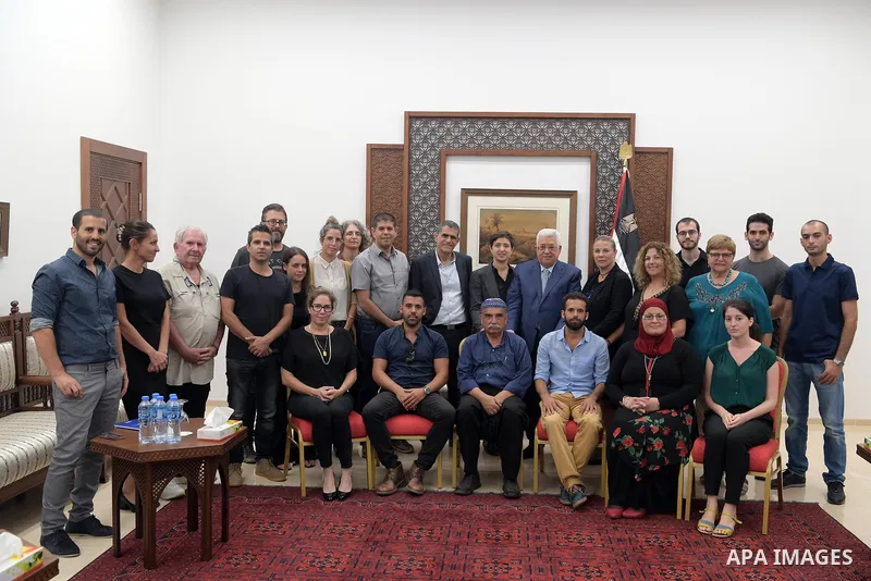 Palestinian President Mahmoud Abbas, meets with a delegation from the Israeli peace,in the West Bank city of Ramallah, on Sept. 02, 2018. Photo by Thaer Ganaim