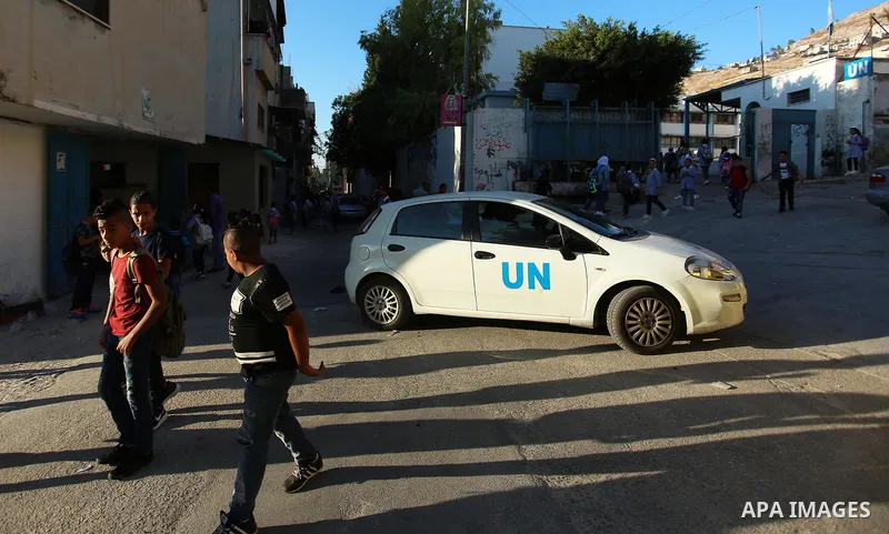 Palestinian students of United Nations-run schools walk in a street at Balata refugee camp near in the West Bank city of Nablus on September 4, 2018. The United States halted all funding to United Nations' agency that he...