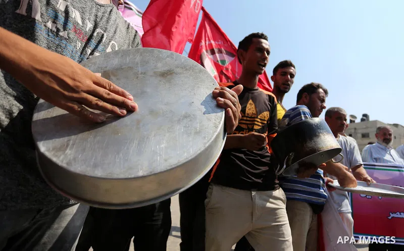 Palestinian Supporters of the Democratic Front for the Liberation of Palestine, take part in a protest against U.S. decision to cut aid to United Nations Relief and Works Agency (UNRWA) in Khan Younis in the southern Gaz...