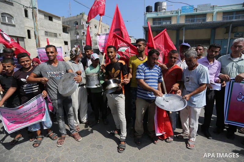 Palestinian Supporters of the Democratic Front for the Liberation of Palestine, take part in a protest against U.S. decision to cut aid to United Nations Relief and Works Agency (UNRWA) in Khan Younis in the southern Gaz...