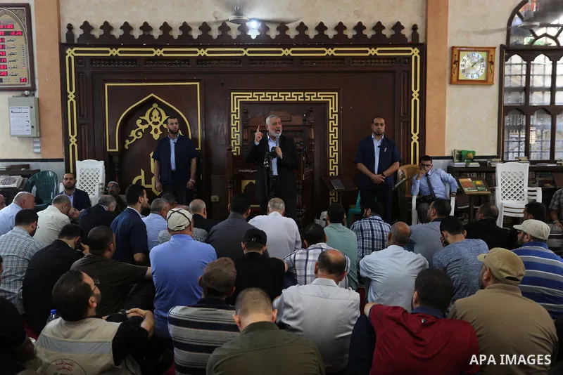 Palestinian Hamas Chief Ismail Haniyeh speaks at a mosque during the funeral of Palestinian Hamas militant Abdul Rahim Abbas ,42, who was killed in an unexplained explosion, in Gaza city, on Sept. 06, 2018. Photo by Ashr...