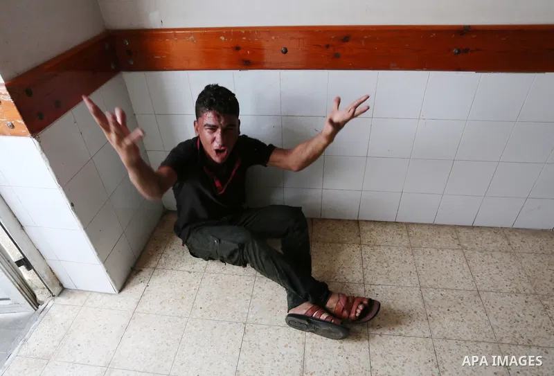 A relative of Palestinian teenager Belal Khafaja, who was killed by Israeli forces during clashes in tents protest at the Israel-Gaza border, mourns at a hospital in Rafah in the southern Gaza Strip on September 7, 2018....