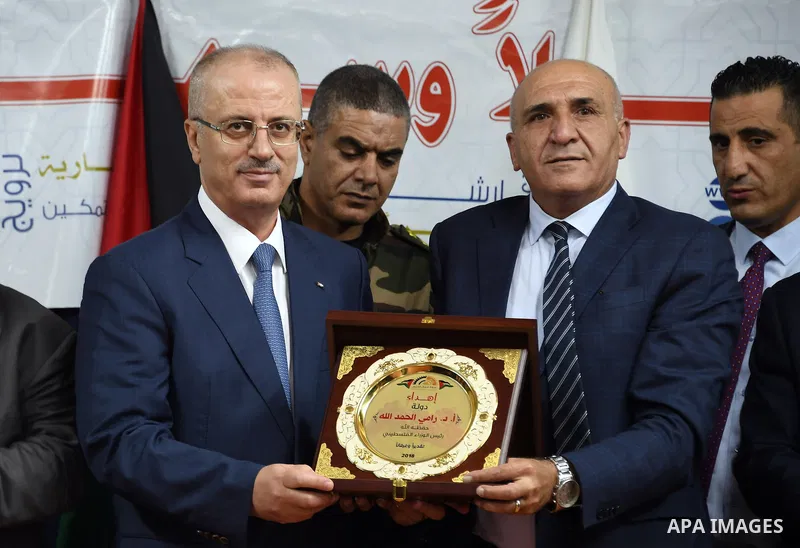 Palestinian Prime Minister, Rami Hamdallah, visits the Halhoul village near in the West Bank city of Hebron on September 10, 2018. Photo by Prime Minister Office
