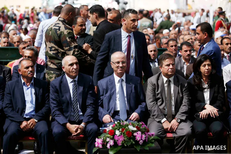 Palestinian Prime Minister Rami Hamdallah attends the Palestinian grapes festival in Halhoul village, near the West Bank city of Hebron, on September 10, 2018. Hebron is very famous in grape production as it contains man...