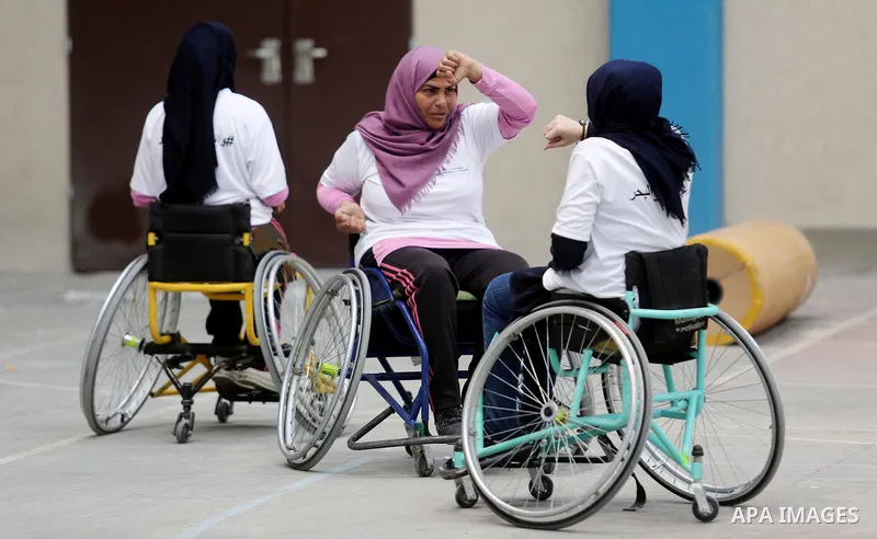 Palestinian handicappeds on wheelchairs take part in a Karate lesson, at a club in Gaza city on September 11, 2018. Photo by Ashraf Amra