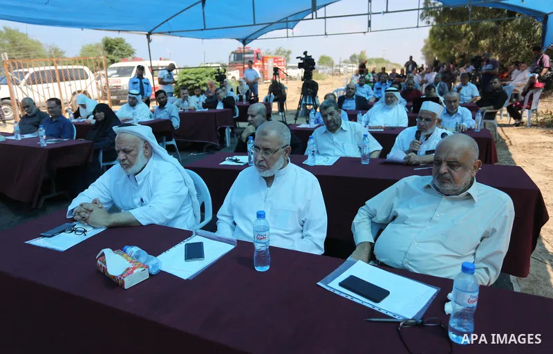 Members of the Palestinian legislative council attend a meeting on the occasion of the 25th anniversary of the Oslo accords, in the southern of Gaza strip on September 12, 2018. Photo by Ashraf Amra