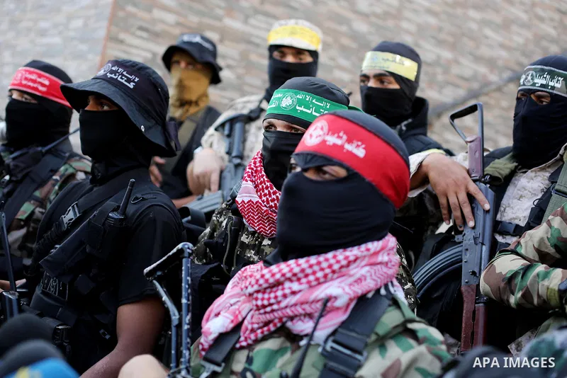 Members of various Palestinian armed factions take part in a press conference at the legislative council, on the occasion of the 25th anniversary of the Oslo accords, in Gaza city on September 12, 2018. The Oslo Accords...