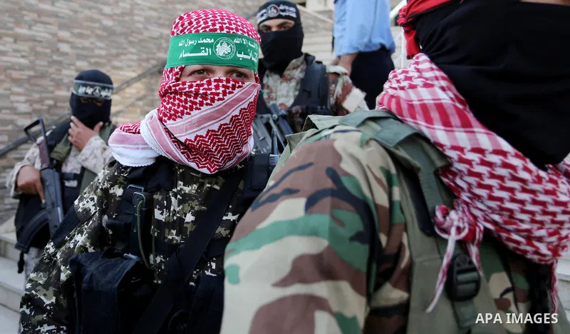 Members of various Palestinian armed factions take part in a press conference at the legislative council, on the occasion of the 25th anniversary of the Oslo accords, in Gaza city on September 12, 2018. The Oslo Accords...