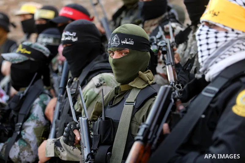 Members of various Palestinian armed factions take part in a press conference at the legislative council, on the occasion of the 25th anniversary of the Oslo accords, in Gaza city on September 12, 2018. The Oslo Accords...