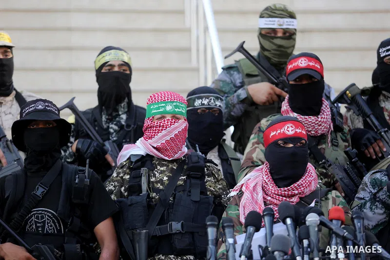 Members of various Palestinian armed factions take part in a press conference at the legislative council, on the occasion of the 25th anniversary of the Oslo accords, in Gaza city on September 12, 2018. The Oslo Accords...