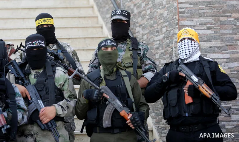 Members of various Palestinian armed factions take part in a press conference at the legislative council, on the occasion of the 25th anniversary of the Oslo accords, in Gaza city on September 12, 2018. The Oslo Accords...