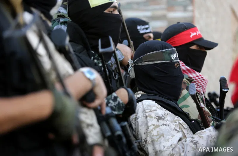 Members of various Palestinian armed factions take part in a press conference at the legislative council, on the occasion of the 25th anniversary of the Oslo accords, in Gaza city on September 12, 2018. The Oslo Accords...