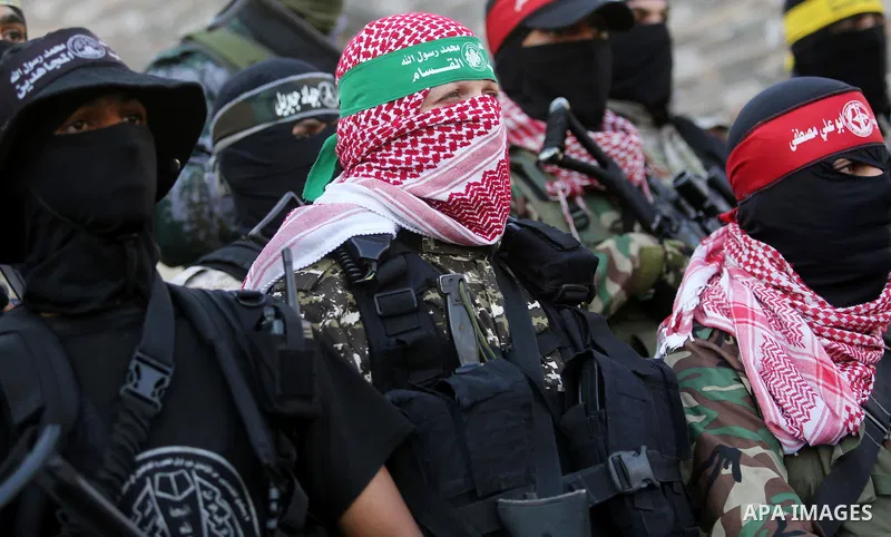 Members of various Palestinian armed factions take part in a press conference at the legislative council, on the occasion of the 25th anniversary of the Oslo accords, in Gaza city on September 12, 2018. The Oslo Accords...