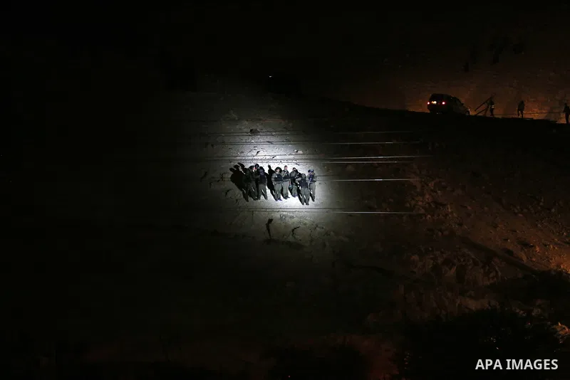 Israeli forces stand guard as the Israeli army remove shacks erected by Palestinian activists to protest against Israel's plan to demolish the Palestinian Bedouin village of Khan al-Ahmar, in Khan al-Ahmar, in the occupi...