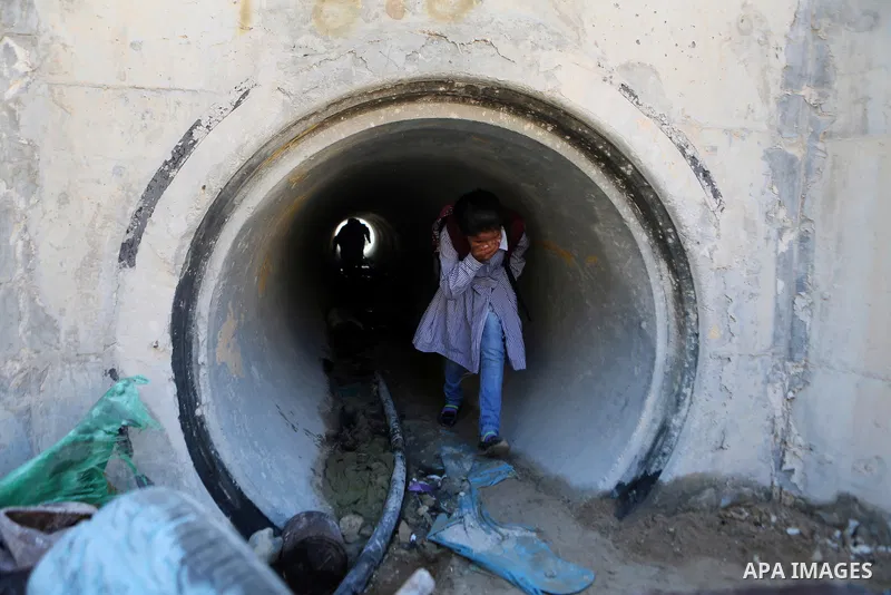 Palestinian Bedouin school children walk in the village of Khan al-Ahmar in the Israeli occupied West Bank on September 16, 2018. Photo by Shadi Hatem
